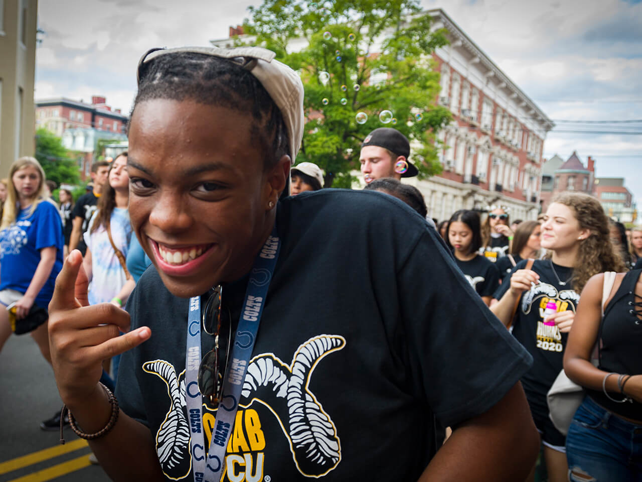 male student celebrating at a spirit event