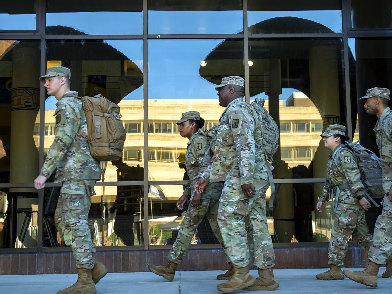Group of students wearing military style uniforms