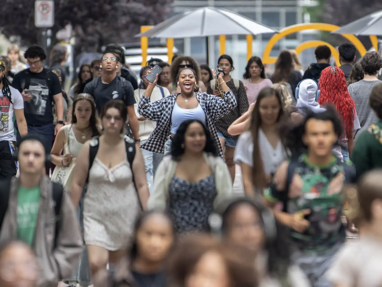 A large group of students walking to class